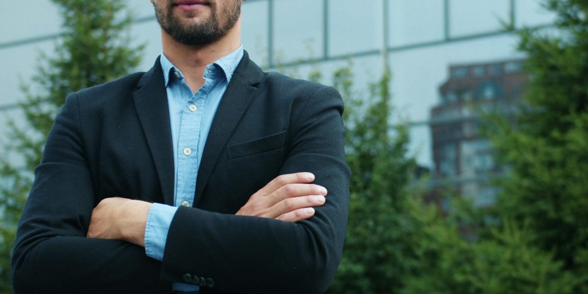 An individual confidently looking towards their career trajectory, symbolizing growth and specialization in cloud engineering roles.