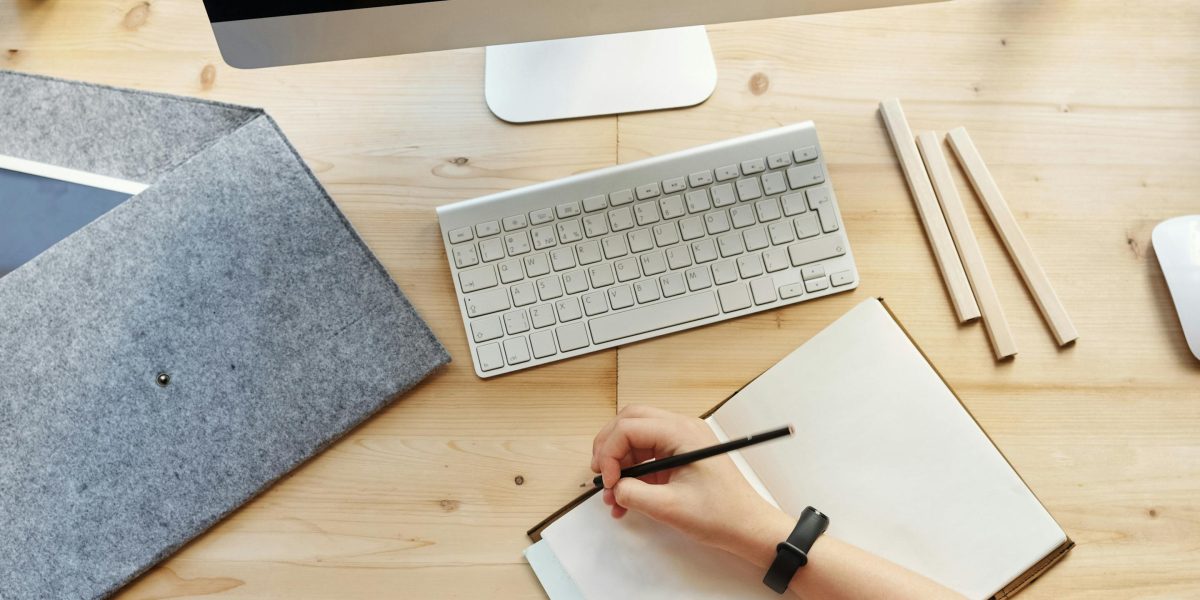 An individual focused on a laptop, embodying continuous learning to acquire new technical skills.