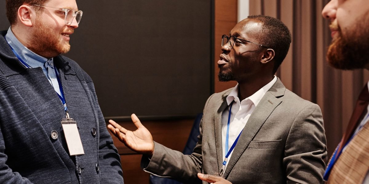 Enterprise leaders engaging in a focused discussion, emphasizing the importance of a clear analytics definition for strategic decision-making.