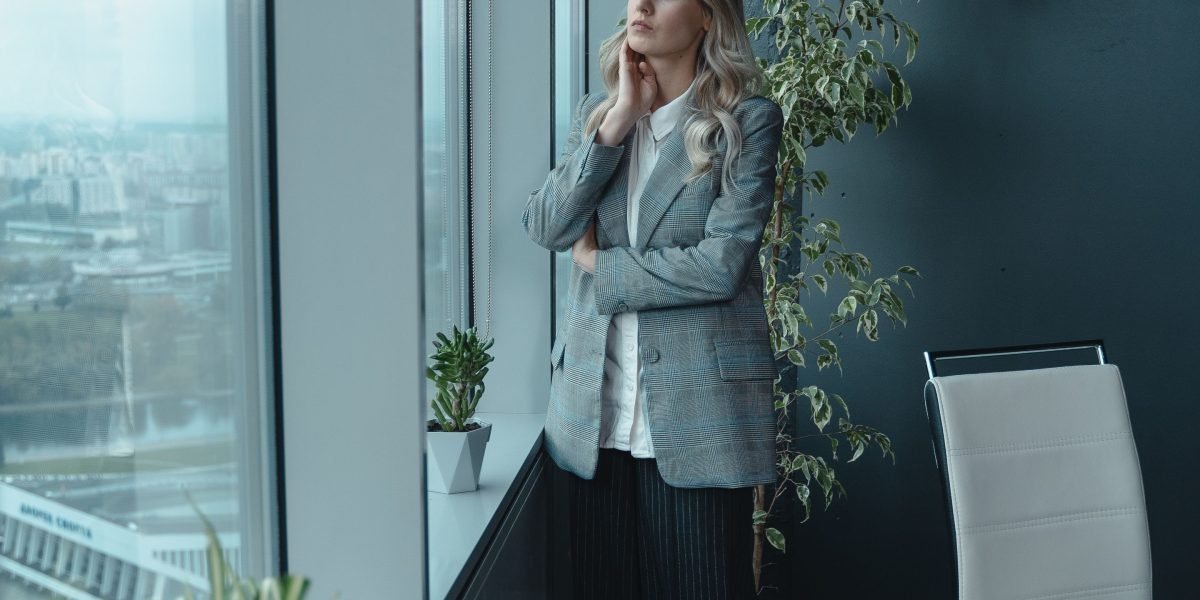 A business leader deep in thought, grappling with the complexities of scaling AI initiatives from pilots to impactful value creation.