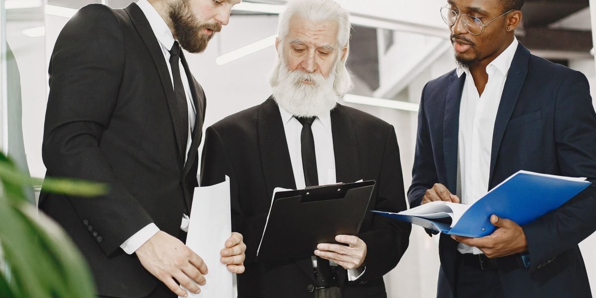 Executives engaging in a strategic discussion, likely prioritizing high-impact AI use cases for business growth.