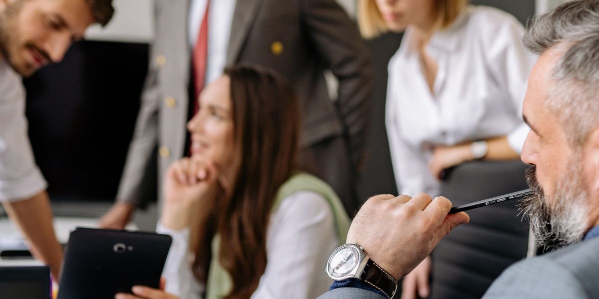 Teams collaborating seamlessly, demonstrating enhanced productivity through unified systems.