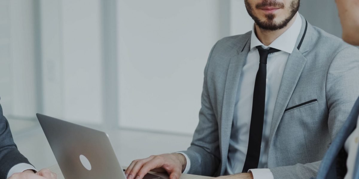 A team of confident professionals in an office setting, collaborating effectively and making smart decisions.