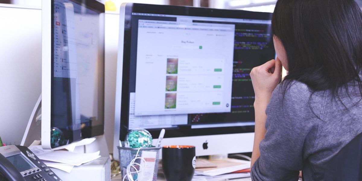 An enterprise IT leader contemplating strategic challenges amidst demands for faster software delivery and stricter compliance.