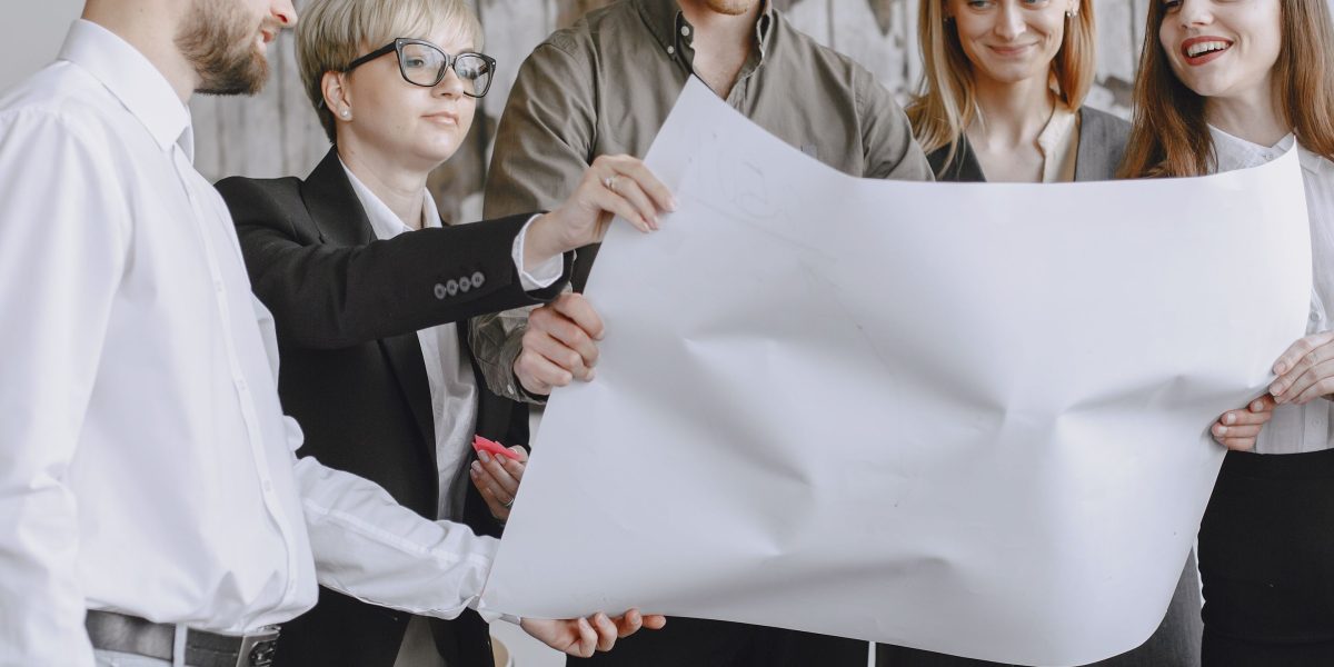 Team members collaborate to create a unified, trusted record of IT assets, connecting different data points for a clear picture.