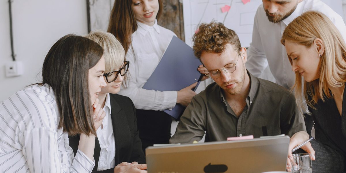 A diverse team collaborates to understand and optimize their complex cloud ecosystem.