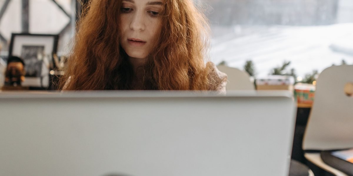 A person engaged in an online assessment, demonstrating skills for a remote technical product manager role.