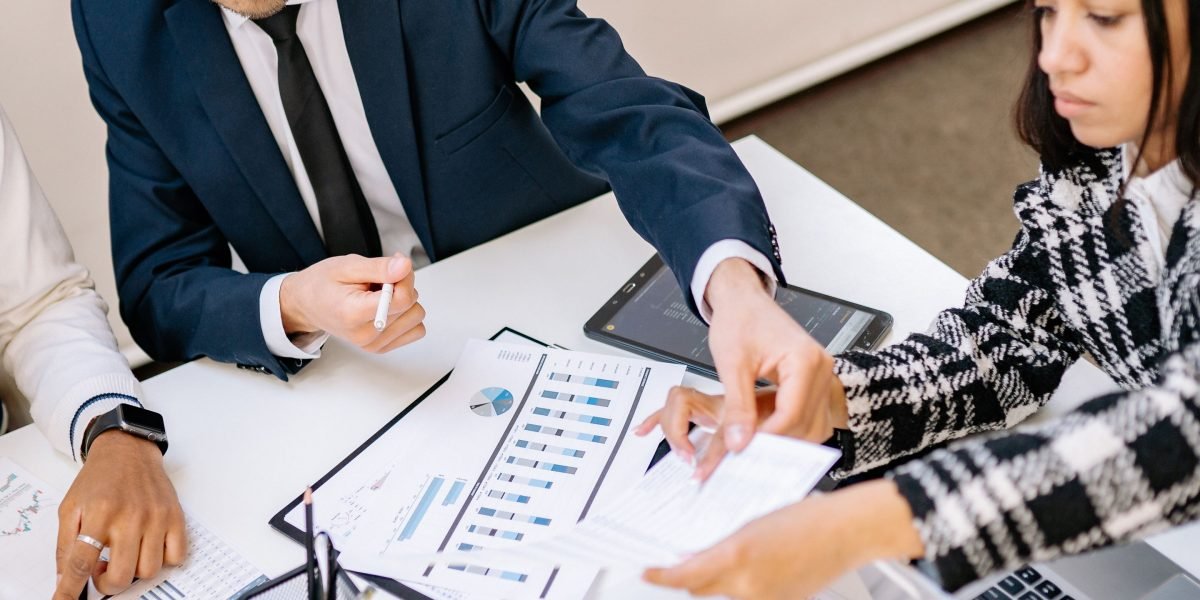 A team collaborating to ensure data security, compliance, and governance policies are effectively implemented.