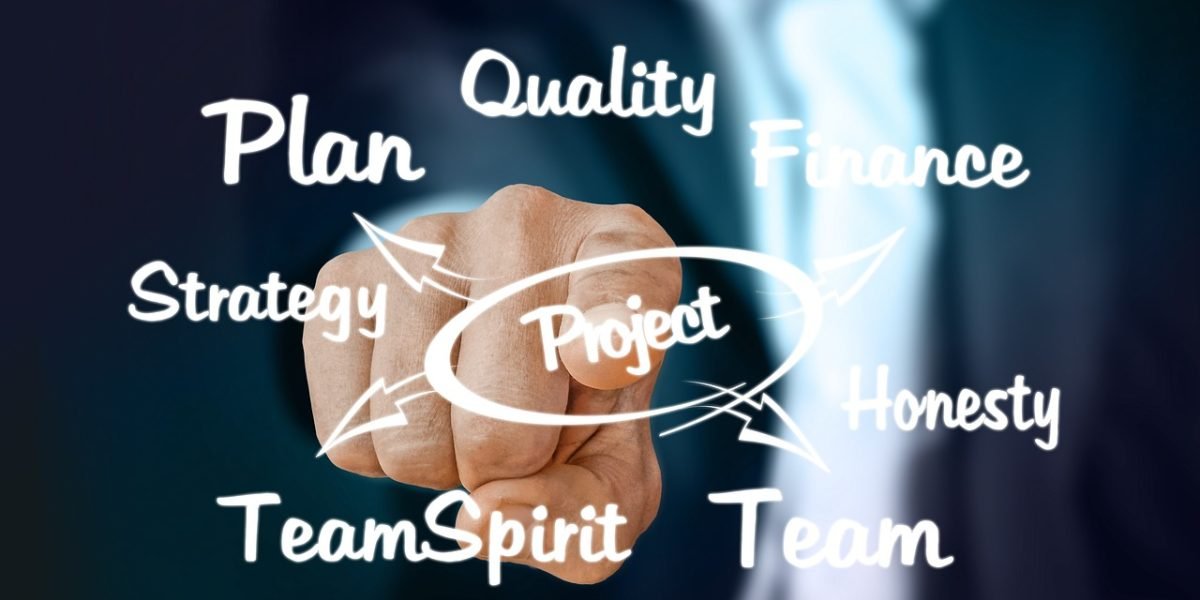 A team of professionals collaborating and discussing a new strategy in a modern office environment.