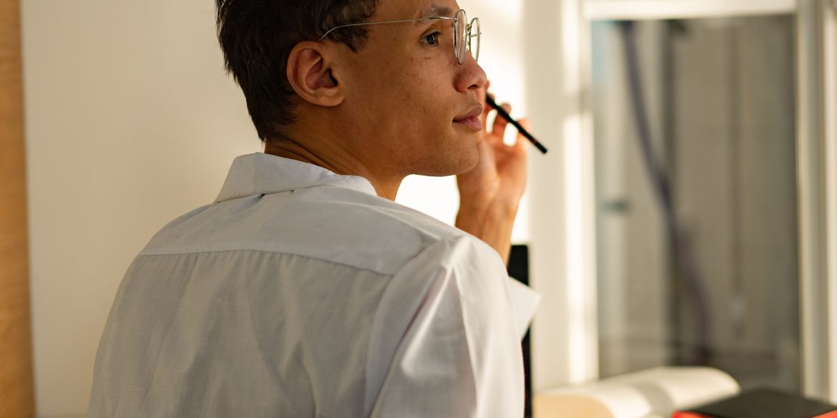A business leader contemplating complex choices, reflecting the challenge of selecting the right enterprise software.