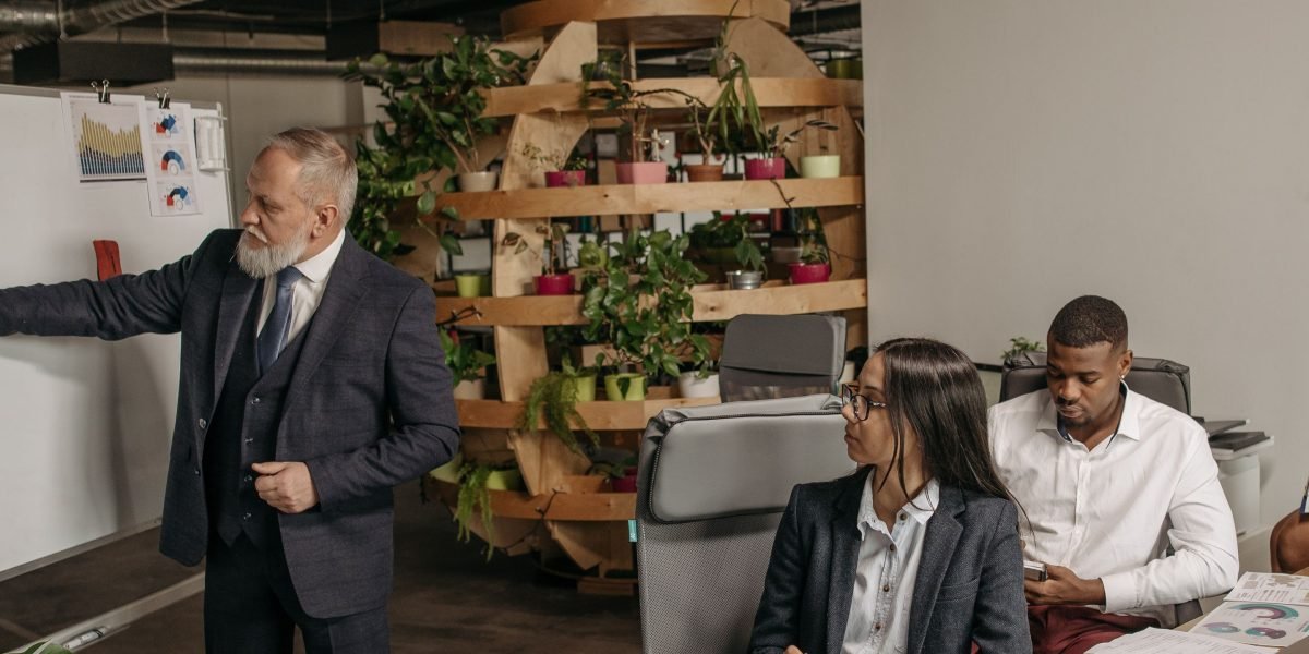 A team of professionals collaborates on cybersecurity strategies, emphasizing data protection and compliance.