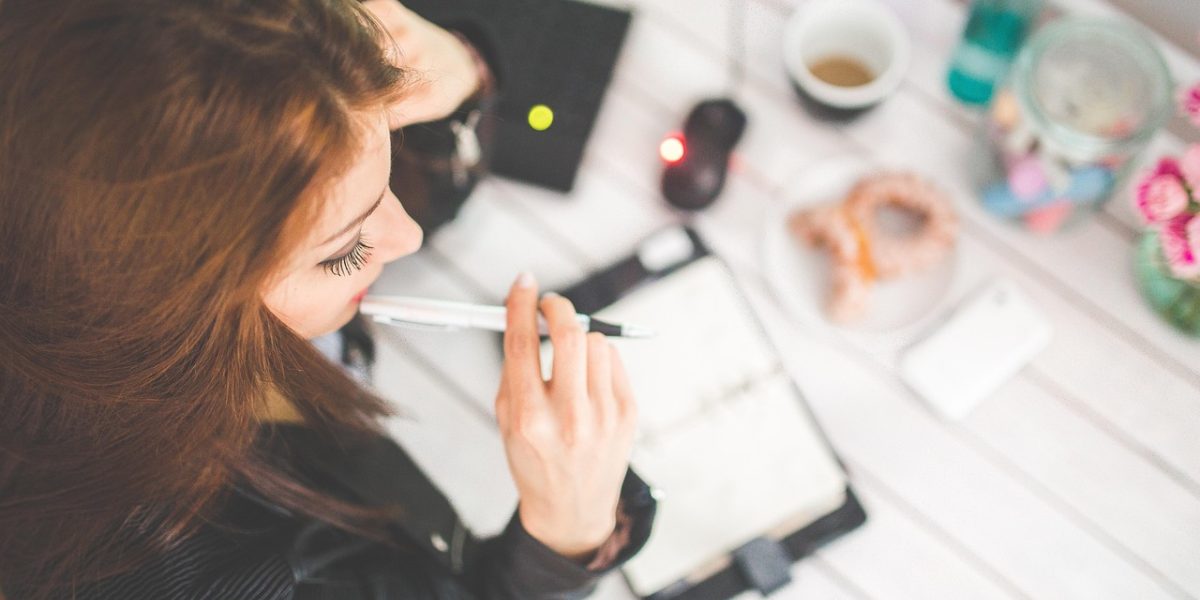 A professional deeply considers strategic choices, reflecting the importance of selecting the right consulting firm.