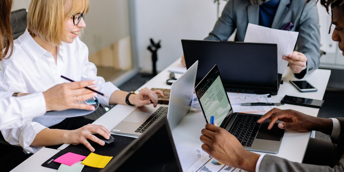 A diverse team collaborating effectively in a dynamic work environment, adapting to new challenges.
