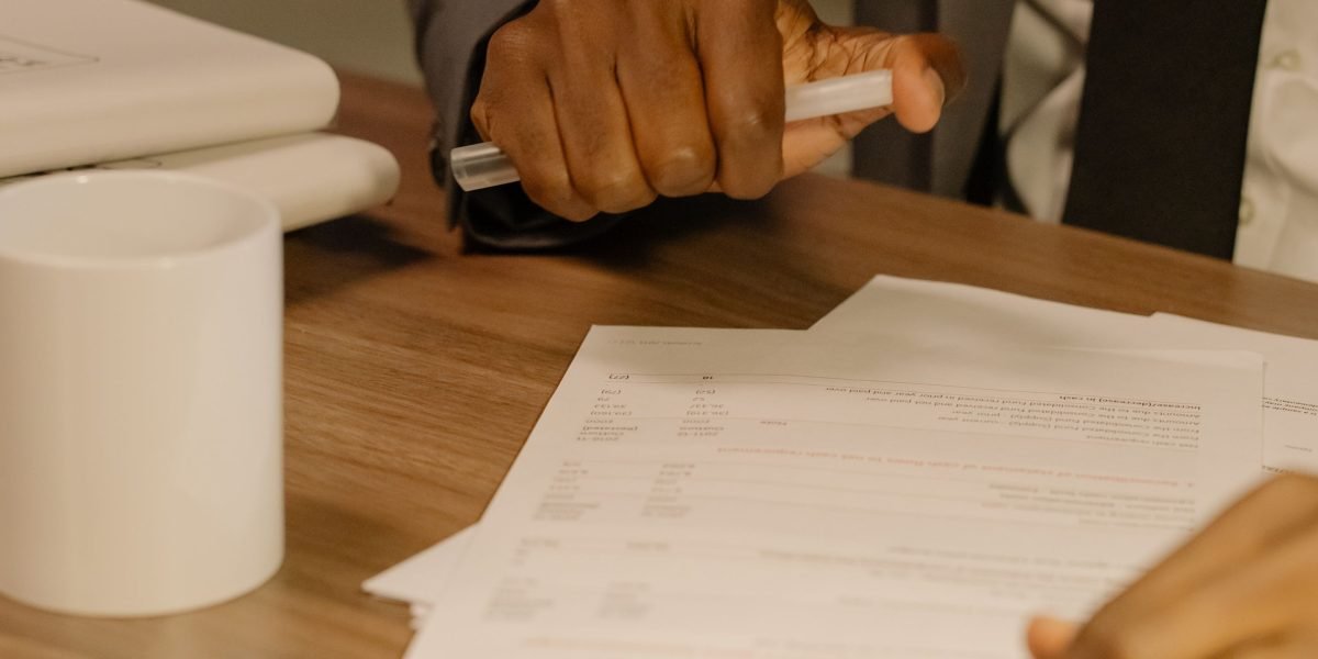 A professional thoughtfully reviewing security protocols or data protection strategies for cloud systems.