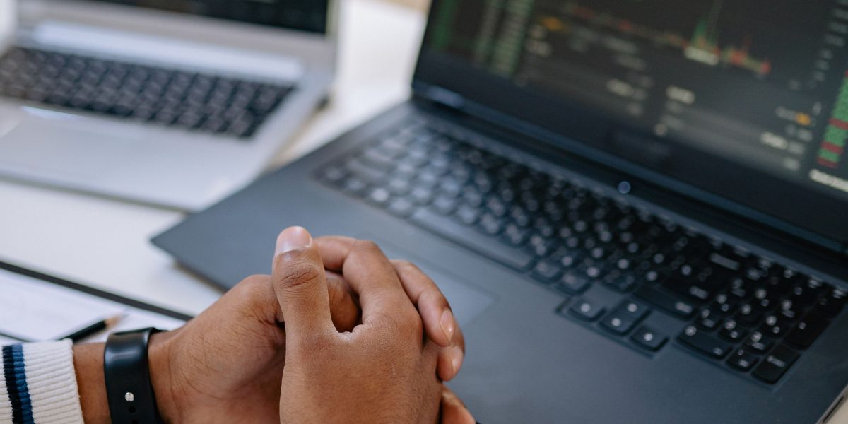 A professional intently analyzing data, seeking insights for project success.