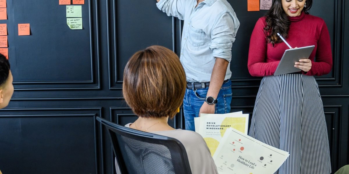 A team collaborating to leverage AI and machine learning for business innovation.